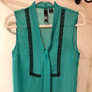 Aqua sleeveless blouse with front neck tie